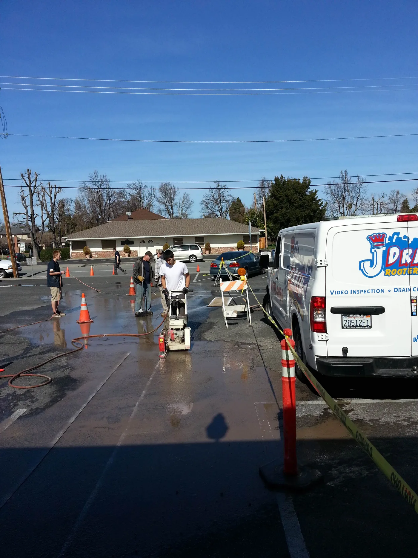 A J Drains crew working a street job.