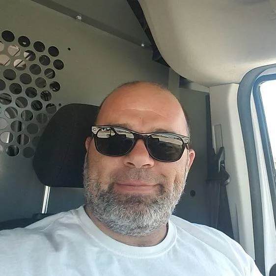 Jason, the owner, in the van.
